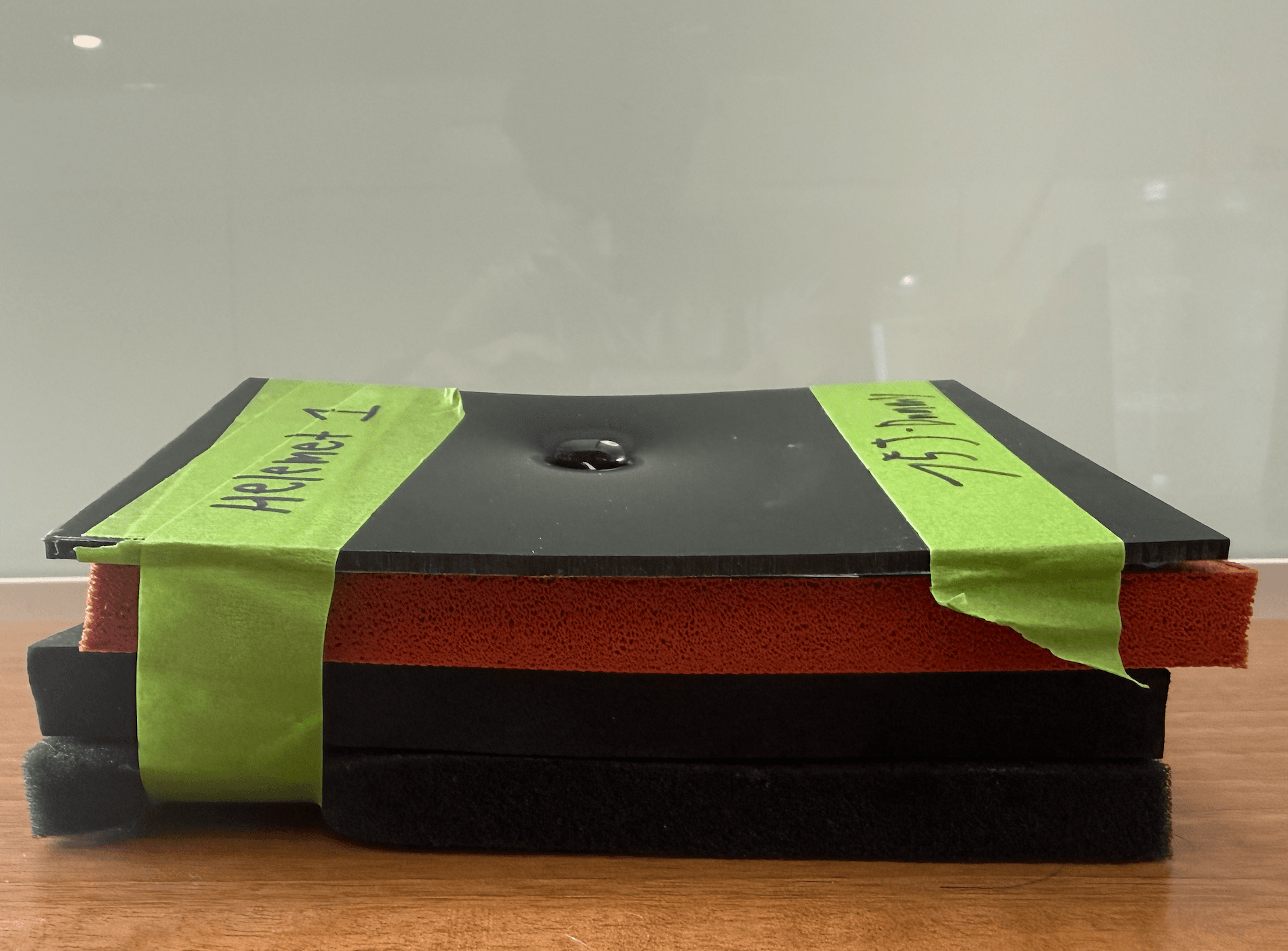 Side view of all helmet liner layers stacked together